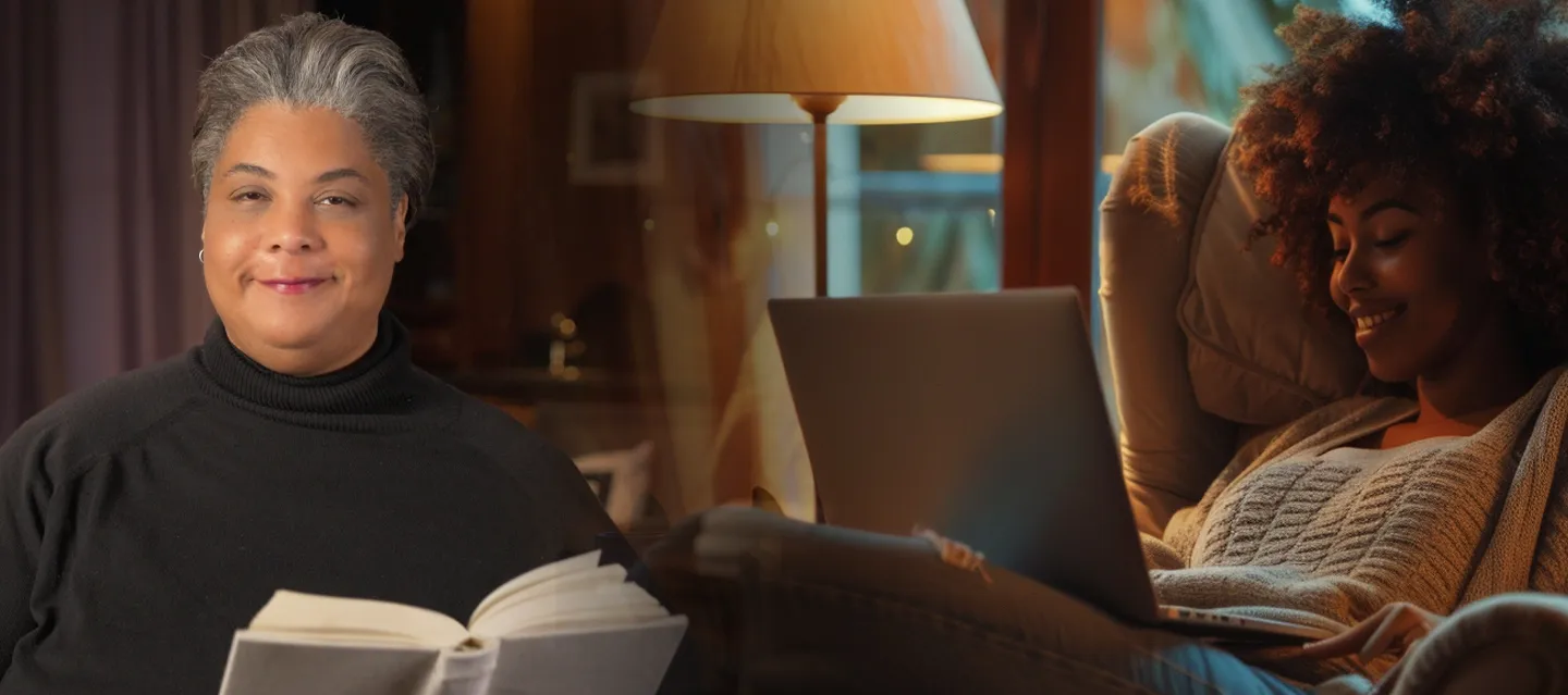 Two women reading,
          one sitting in a chair with a laptop and a book.